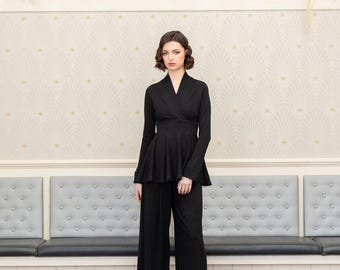 Scarlet stretch peplum top with V-neckline and raglan sleeve