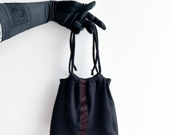 Cinched drawstring cocktail purse with satin detail made with fabric remnants