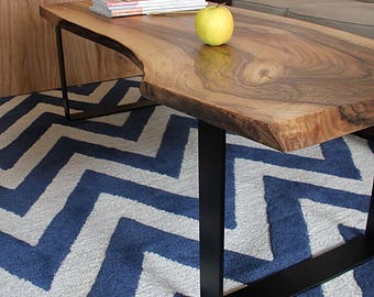 Live edge solid walnut coffee table on u-form legs