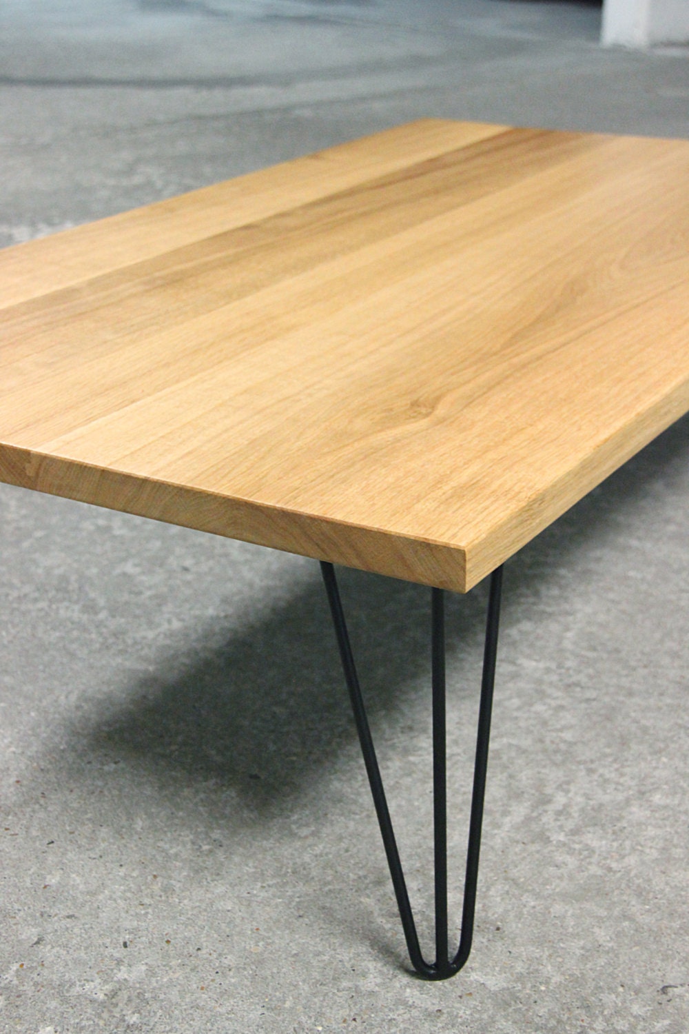 Solid Oak coffee table on hairpin legs