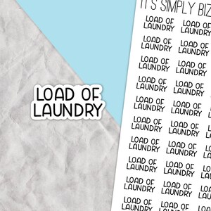 May include: A sheet of stickers with the text "LOAD OF LAUNDRY" repeated multiple times in black text on a white background.