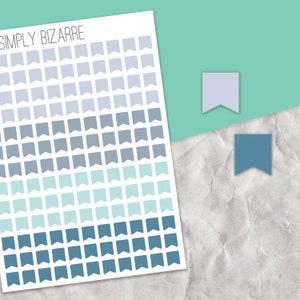 May include: A sheet of stickers with a gradient of blue, teal, and light blue pennant shapes. The sheet has the text "SIMPLY BIZARRE" at the top.