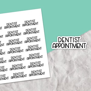 May include: A sheet of white paper with black text that reads "Dentist Appointment" repeated multiple times. The text is arranged in a grid pattern.