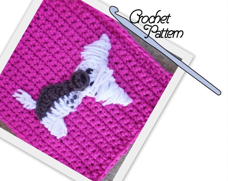 May include: A crochet square with a white and brown dog applique on a pink background. The text "Crochet Pattern" is visible in the top right corner of the image.