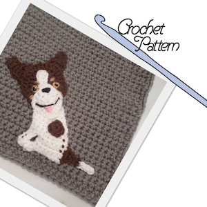 May include: Crochet pattern for a brown and white dog with brown ears and spots. The dog is sitting up with its tongue sticking out. The pattern is on a grey crocheted background. The text "Crochet Pattern" is written in blue on a white background.