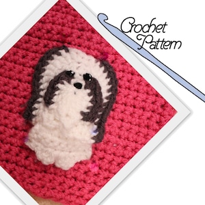May include: A crochet pattern for a pink hat with a white and gray Shih Tzu dog applique. The pattern includes a crochet hook.