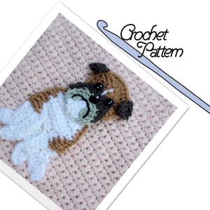 May include: A close-up of a crocheted dog applique in brown, white, and green. The dog is lying down with its head turned to the side. The applique is on a pink crocheted background. The text "Crochet Pattern" is visible in the upper right corner of the image.
