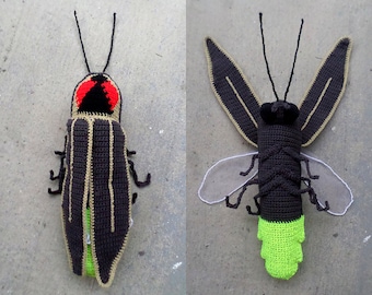 May include: A crocheted firefly toy with black and brown wings, red eyes, and a green glowing tail. The toy is shown from two angles.