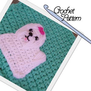 May include: A crochet pattern for a white dog with a pink bow. The dog is sitting on a green crochet background. The image includes the text "Crochet Pattern".