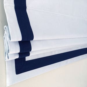 Custom roman shade, flat roman shades with three side 2 inch Navy borders, roman shades with chain mechanism, window treatments