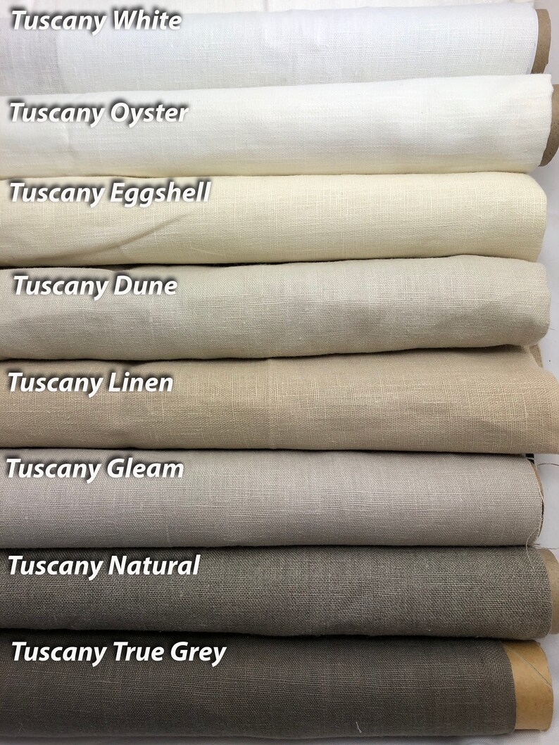 May include: Eight fabric swatches in various shades of gray, from white to dark gray. The swatches are labeled with the names 'Tuscany White', 'Tuscany Oyster', 'Tuscany Eggshell', 'Tuscany Dune', 'Tuscany Linen', 'Tuscany Gleam', 'Tuscany Natural', and 'Tuscany True Grey'.