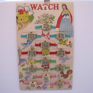Vintage Lot Of 12 Tin Toy Novelty Watches And Its Original &quot;Fairytale Watch&quot; Display Card (Japan) 1960