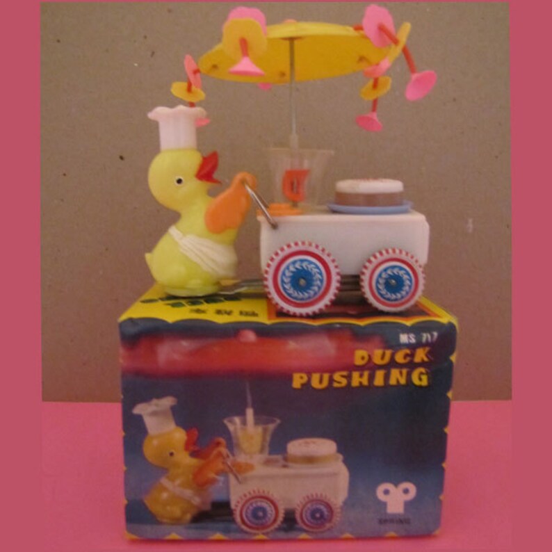 Vintage Wind up Tin Toy Duck Pushing Cart china MS 717 Etsy