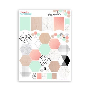May include: A sheet of planner stickers with various geometric shapes and banner designs. The stickers feature a mix of colors, including mint green, peach, wood grain, marble, and black and white patterns. The text "Hexanotes" is at the top.