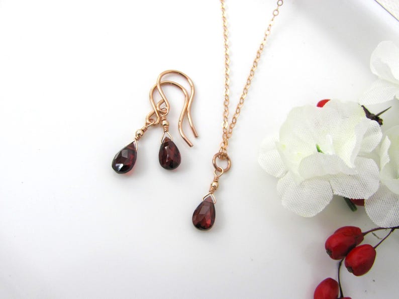 Garnet necklace and earring set in rose gold filled. Minimal and dainty with natural garnet pear briolettes in a simple drop style.