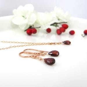 Garnet necklace and earring set in rose gold filled. Minimal and dainty with natural garnet pear briolettes in a simple drop style.