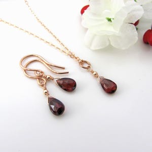 Garnet necklace and earring set in rose gold filled. Minimal and dainty with natural garnet pear briolettes in a simple drop style.