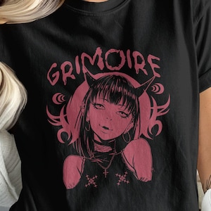 Gothic Anime Devil Print Grimoire T-Shirt, Pastel Goth Demon Aesthetic, Cute Vibe Oversized Tee, Dark Fantasy Streetwear, Graphic Tee Shirt