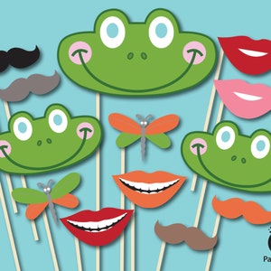 May include: Set of 10 green frog, butterfly, and mustache photo booth props. The props are printed on cardstock and attached to wooden sticks. The props are perfect for a frog-themed party.