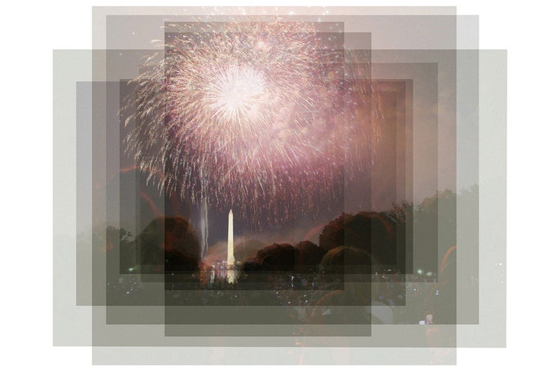 May include: A fireworks display over a city skyline with a white monument in the center.