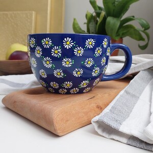 View into the mug showing the white interior alongside the handle
