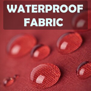 May include: Close-up of red fabric with water droplets on the surface. The fabric is labeled "Waterproof Fabric".