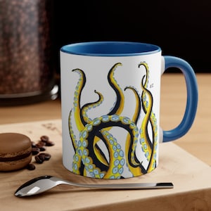 Tazza da caffè con accento artistico giallo e nero con tentacoli di polpo danzante, 11 once