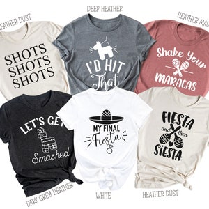 May include: Ten different t-shirts with various designs and colors. The shirts feature phrases like "Shots Shots Shots", "I'd Hit That", "Shake Your Maracas", "Let's Get Smashed", "My Final Fiesta", and "Fiesta and then Siesta".