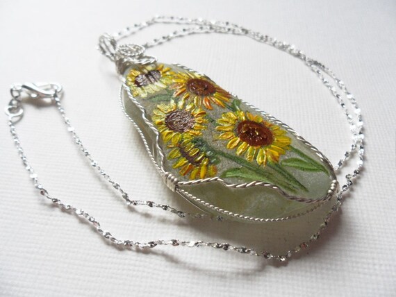 Sunflower Cornflower & lily of the valley handpainted wrapped sea glass necklace Sunflower Cornflower & lily of the valley handpainted wrapped sea glass necklace