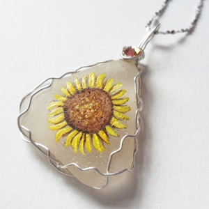 Sunflower Cornflower & lily of the valley handpainted wrapped sea glass necklace Sunflower Cornflower & lily of the valley handpainted wrapped sea glass necklace