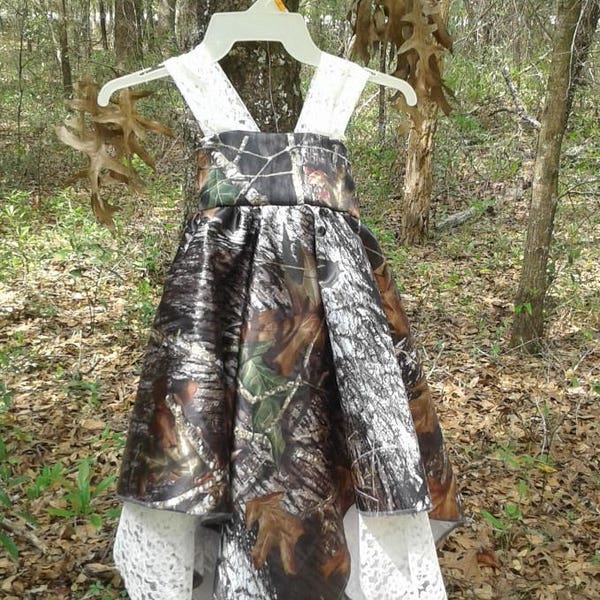 beautiful handkerchief dress with lace trim. Many camo colors to chose from.
