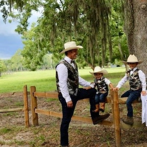 2 pc Men and Boys toddlers, and infants vest & bow tie set. with black backs. Great for weddings or any occasion . Many camo colors