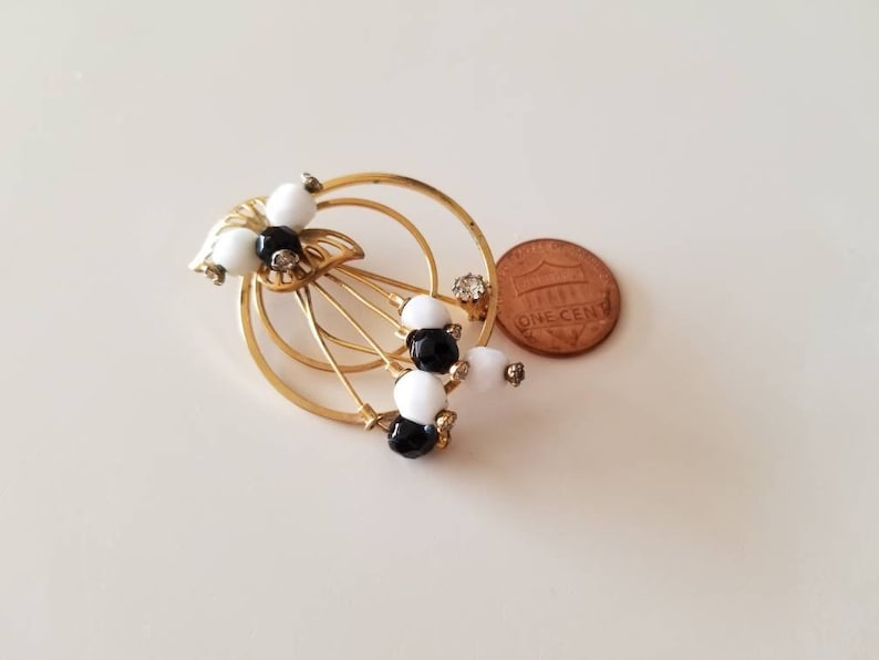 Gold Tone vintage Circle BroochPin with crystals and black and white beads