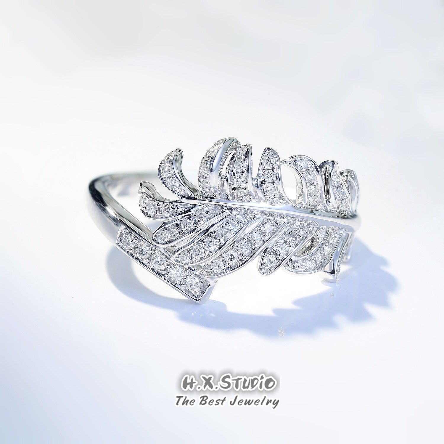 Diamond feather best sale ring