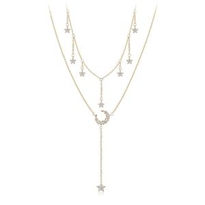 May include: A gold layered necklace with a crescent moon pendant and star accents. The pendant is adorned with small sparkling stones.