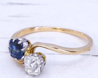 Edwardian 0.51 Carat Sapphire & 0.50 Carat Diamond Crossover Ring, circa 1905