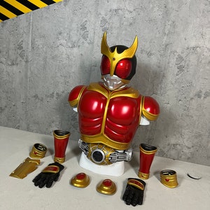 May include: A red and gold plastic action figure costume set. The set includes a torso, two arms, two legs, two gloves, two shoulder pads, a belt, and two wrist cuffs. The figure is a popular character from a Japanese television show.
