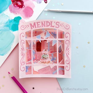 Op maat gemaakte Tunnel Book of Mendl's Pastry Shop van The Grand Budapest Hotel, Pink Mendl's Pastry Box-pop-upkaart, filmillustratiekunst
