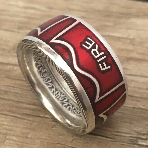 New! .999 Silver Firefighter Coin Ring with beautiful translucent powder coated finish. Sizes 8 - 20 available including 1/4 and 1/2 sizes.