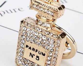 Llavero de lujo con forma de frasco de perfume