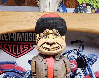Guy in red hat woodcarving from the Everyday People Series hand carved and hand painted by MADellinger Wood Carving # 1139