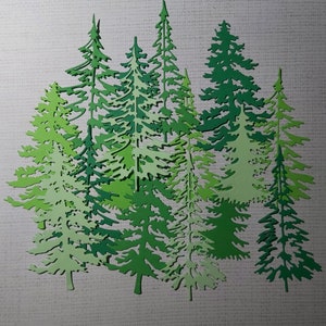Joli ensemble de découpes de 4 sapins verts pour décorer tout vos projets de scrapbooking et autres. Journal, cartes de souhaits, agenda.