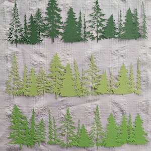 Joli ensemble de découpes de sapins verts pour décorer tout vos projets de scrapbooking et autres. Journal, cartes de souhaits, agenda.