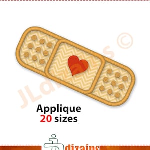 May include: A brown and yellow embroidered applique of a bandage with a red heart in the center. The applique is available in 20 sizes.