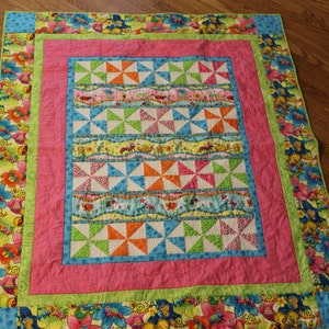 Colorful Pinwheel and Polka Dot Quilt