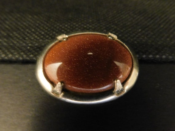 Cool Looking Glittery Copper Colored Cabochon Broo