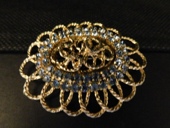 Beautiful Gold Tone Metal Brooch/Pin with Pale Bl… - image 1