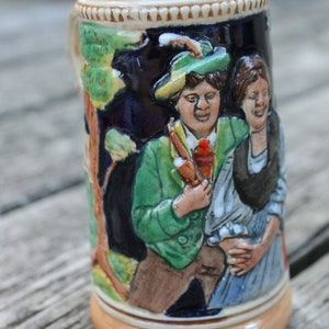 Vintage SG Simon P. Gilles Ceramic Souvenir Beer Stein - Made in Germany - German Man and Woman Smiling Near the Countryside and Mountains