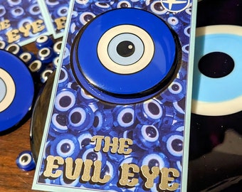 The Evil Eye Enamel Pin designed by AMUN