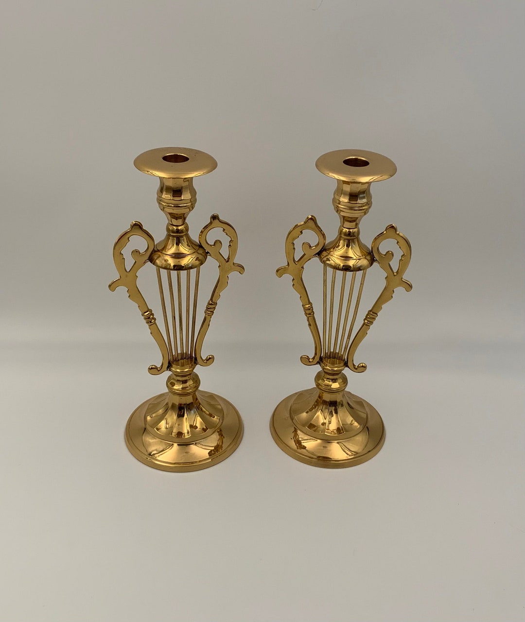 Pair of Art Deco Brass Candle Holders With Musical Lyre Harp Filigree